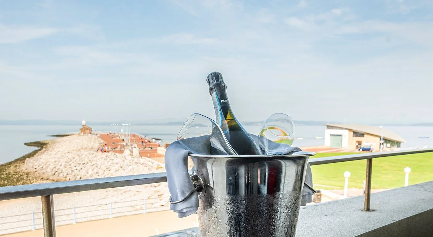 Champagne bucket on a balcony overlooking the bay